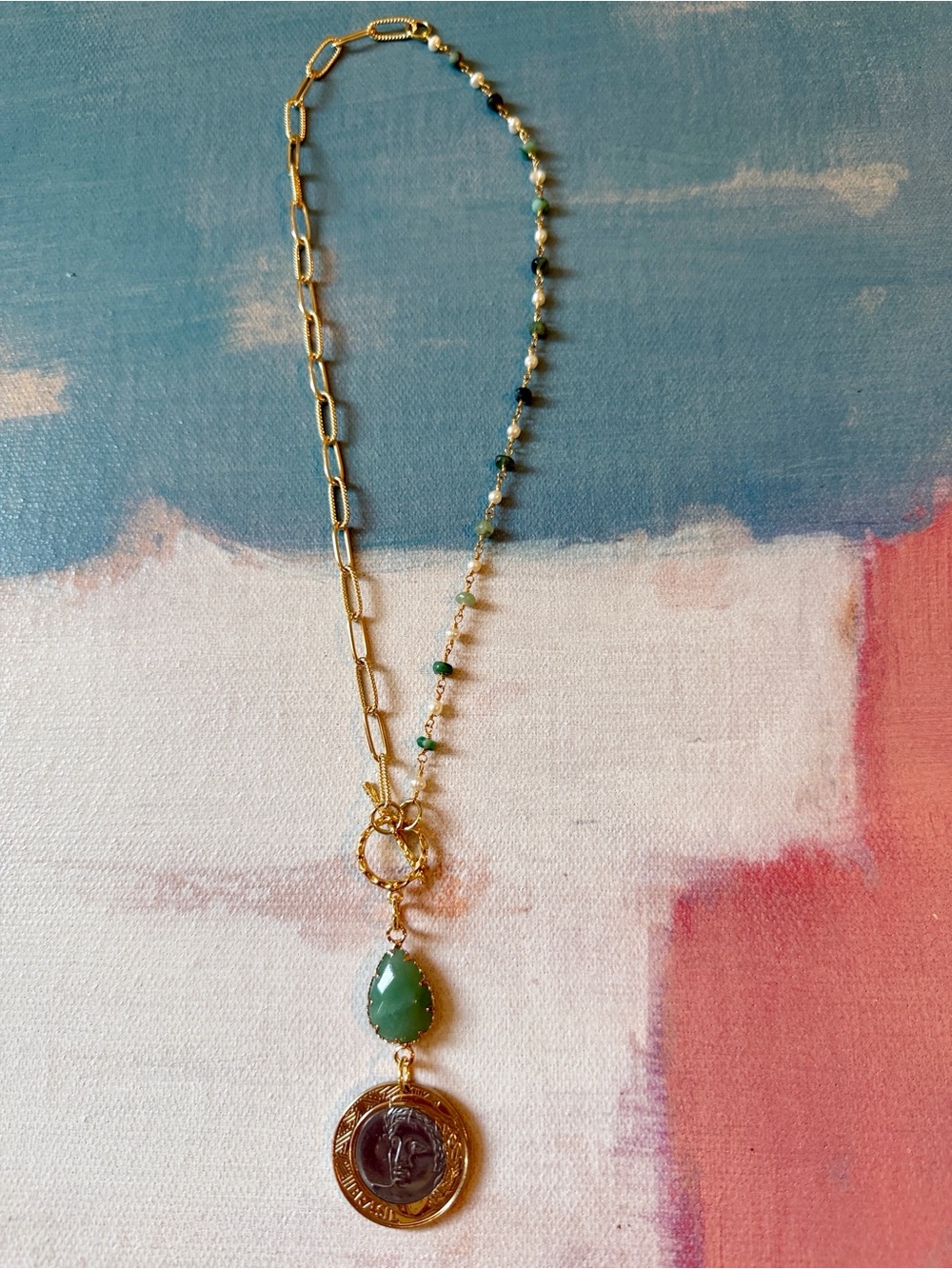 Gold Toned Paperclip Necklace with Coin aEmerald Gem Pendant and Earrings Set